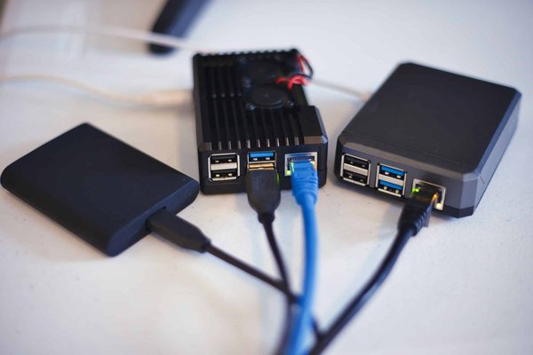 How do you configure a Raspberry Pi 4 as a network-wide ad blocker using Pi-Hole and Unbound for DNS?